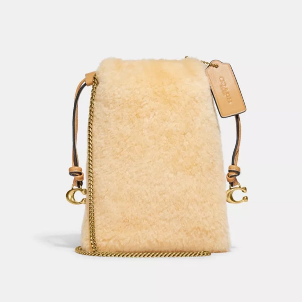 NWT Coach Drawstring bag in Shearling